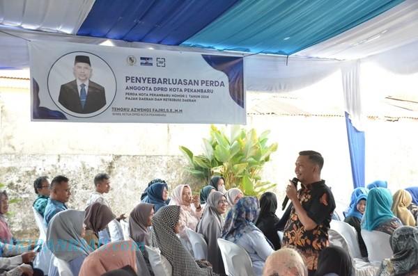 Tengku Azwendi Gelar Penyebarluasan Perda Retribusi Pajak di Jalan Kapling